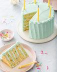 Celebration beeswax birthday candles in a box of 10, eco-friendly and made from pure beeswax, non-toxic and natural; celebration theme, eco-friendliness, non-toxic nature, pure beeswax ingredients.