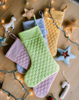 Save the Bees holiday stockings with linen hexagon design, eco-friendly bee-themed, perfect for Christmas gifting, supporting pollinator conservation.