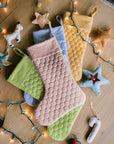 Save the Bees holiday stockings with linen hexagon design, eco-friendly bee-themed, perfect for Christmas gifting, supporting pollinator conservation.