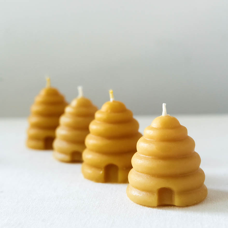 Hand-poured beeswax votive candles, natural, eco-friendly, made from 100% pure beeswax, non-toxic and sustainable, and proudly made in the USA.