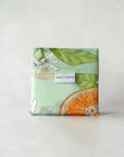 Orange blossom reusable tote bag, eco-friendly, stylish, durable for shopping and everyday use, sustainable gift option.