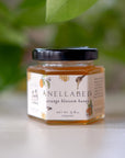 Pure orange blossom honey, 100% natural, raw, aromatic floral flavor, sustainably sourced, perfect for tea and gourmet recipes.