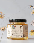 Raw wildflower honey, locally sourced from Colorado, 100% natural and pure, sustainably harvested, perfect for sweetening drinks and recipes.